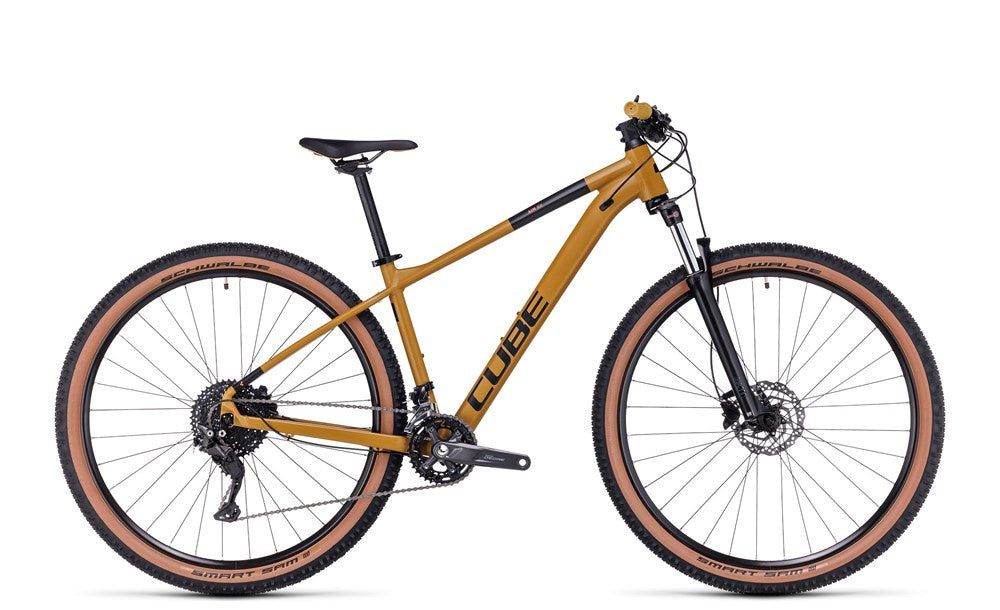 a bike parked on top of a white surface