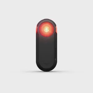 a close up of a mouse on a white surface