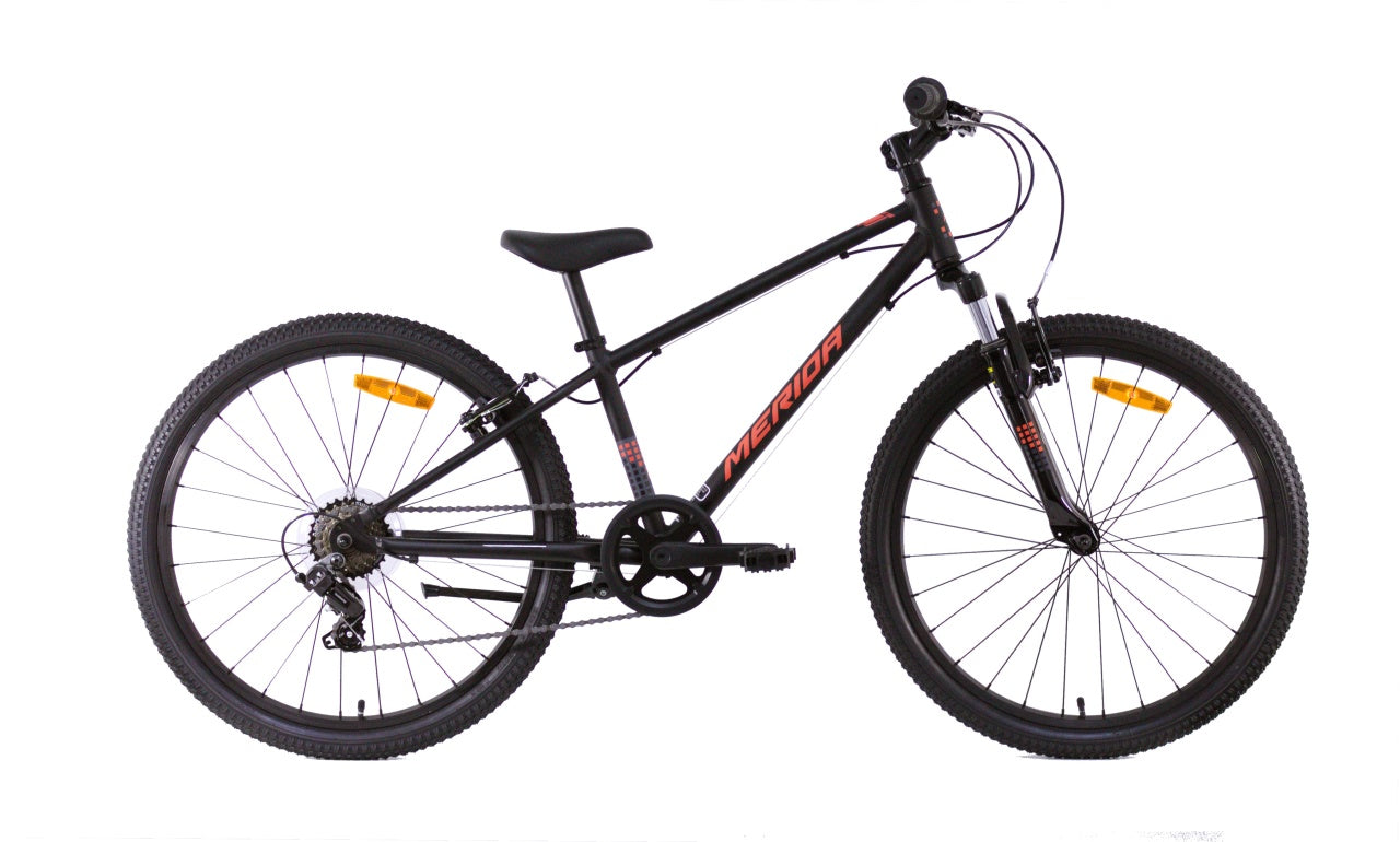 Black and orange bicycle with knobby tires, front fork, and straight handlebar.