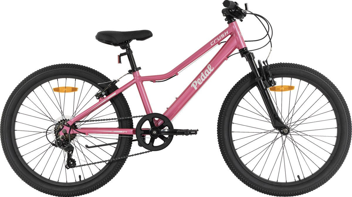 Pink 24-inch youth mountain bike with front suspension fork and black tires