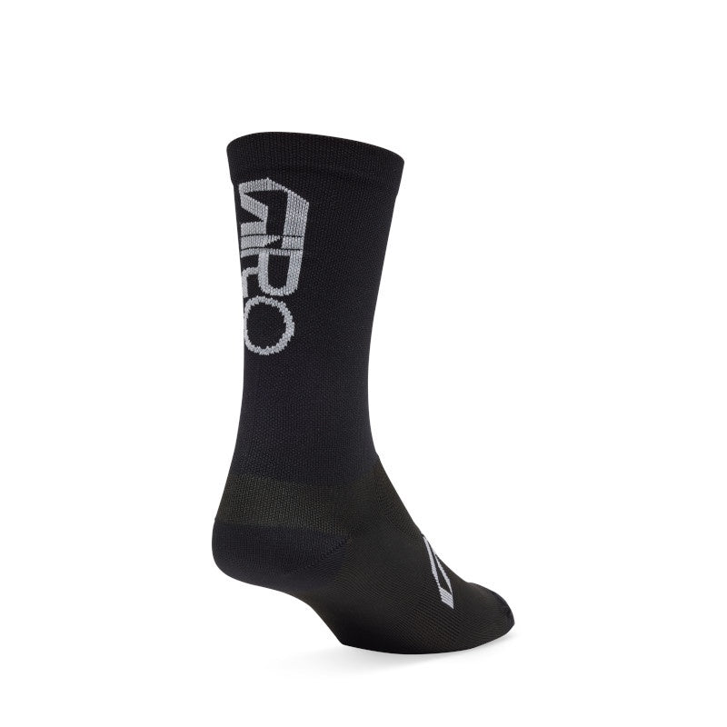 Black high-rise cycling sock with Giro logo and cushioned sole