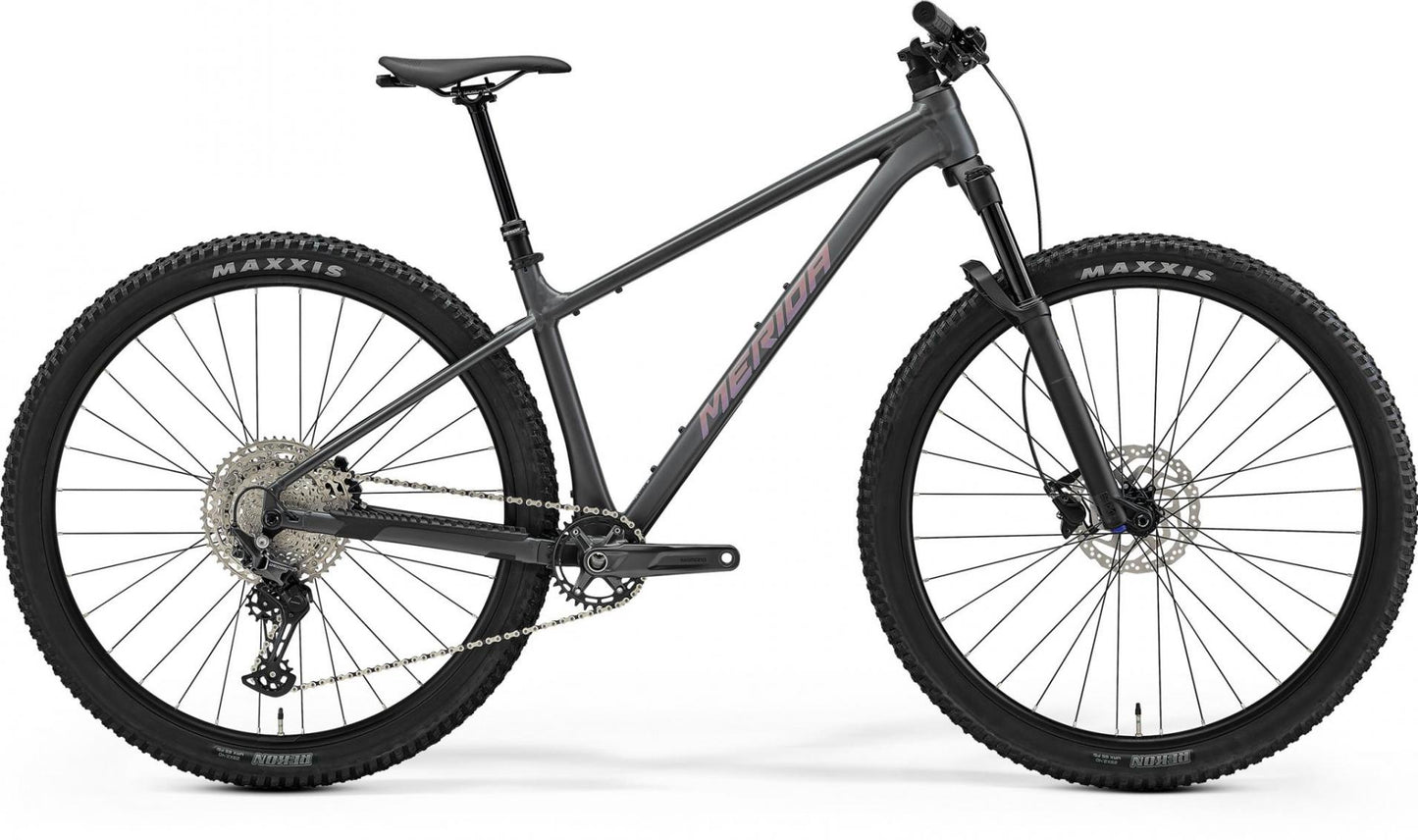 Dark grey mountain bike with front suspension fork
