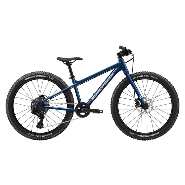 Blue mountain bike with front suspension and 26in wheels
