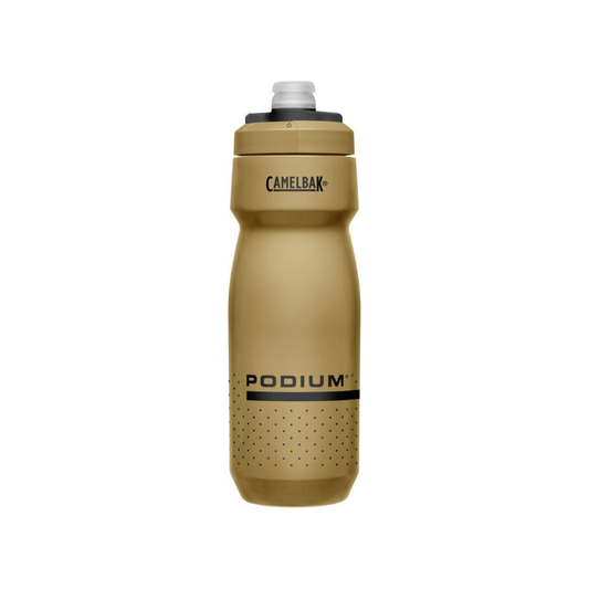 a bottle sitting on top of a wooden table 