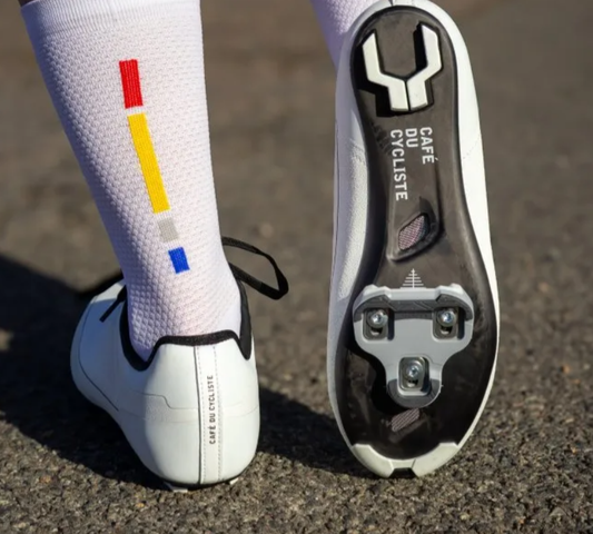 Pair of cycling shoe cleats with Keo Grip mechanism, silver and black