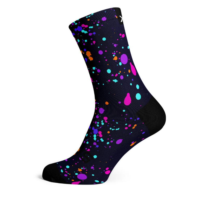 Crew socks in dark purple with colorful splash pattern, crew length ankle fit