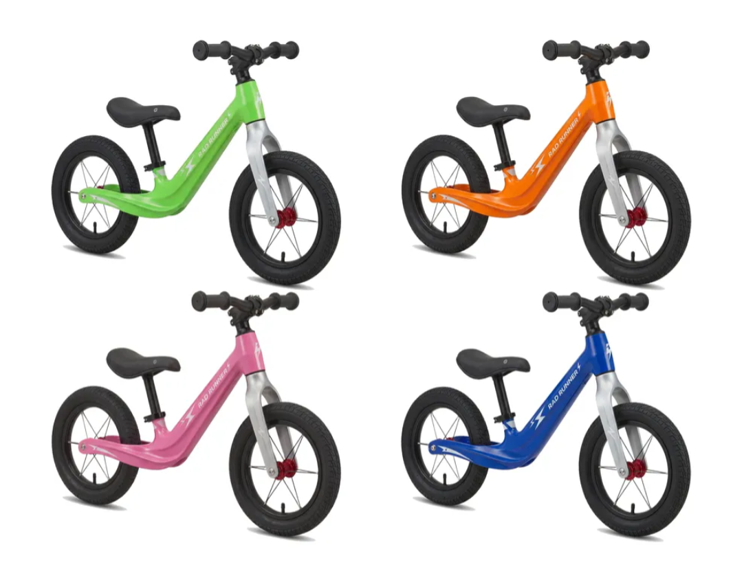 12-inch balance runner bike set in blue, orange, lime, and pink with black seat