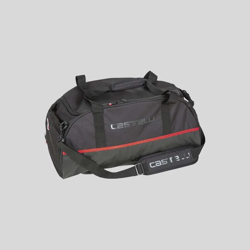 Castelli gear duffle bag in dark gray with red trim, zip pockets, and carry strap